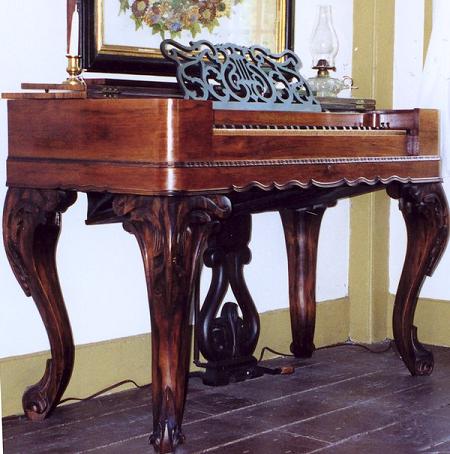 An antique melodeon An antique melodeon
